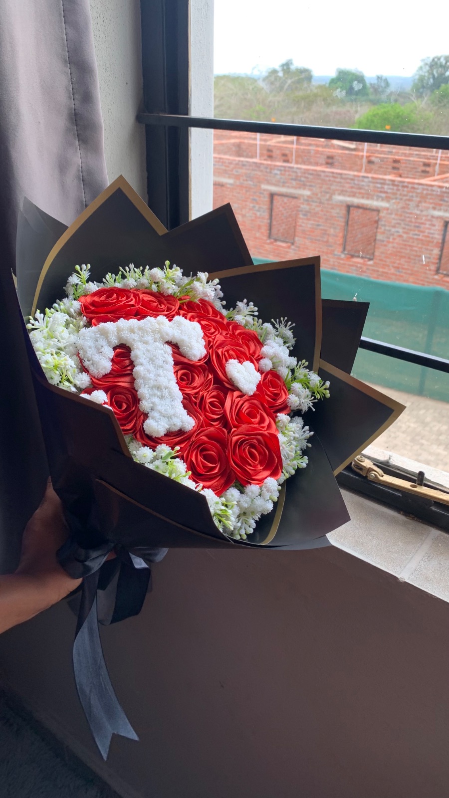 16 count roses with an alphabet and baby breath